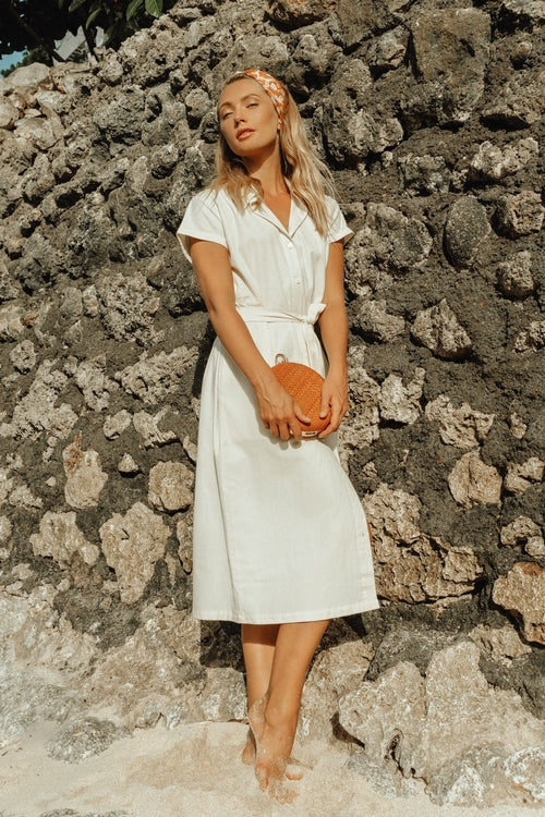 ARYA Safari Linen Midi Dress – Off White - 3/4 angled view on model - Be Juliet