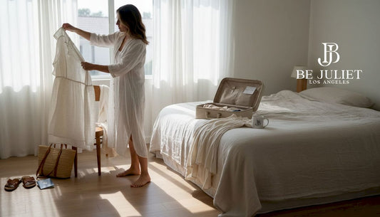 Woman choosing between beach cover-ups in bedroom