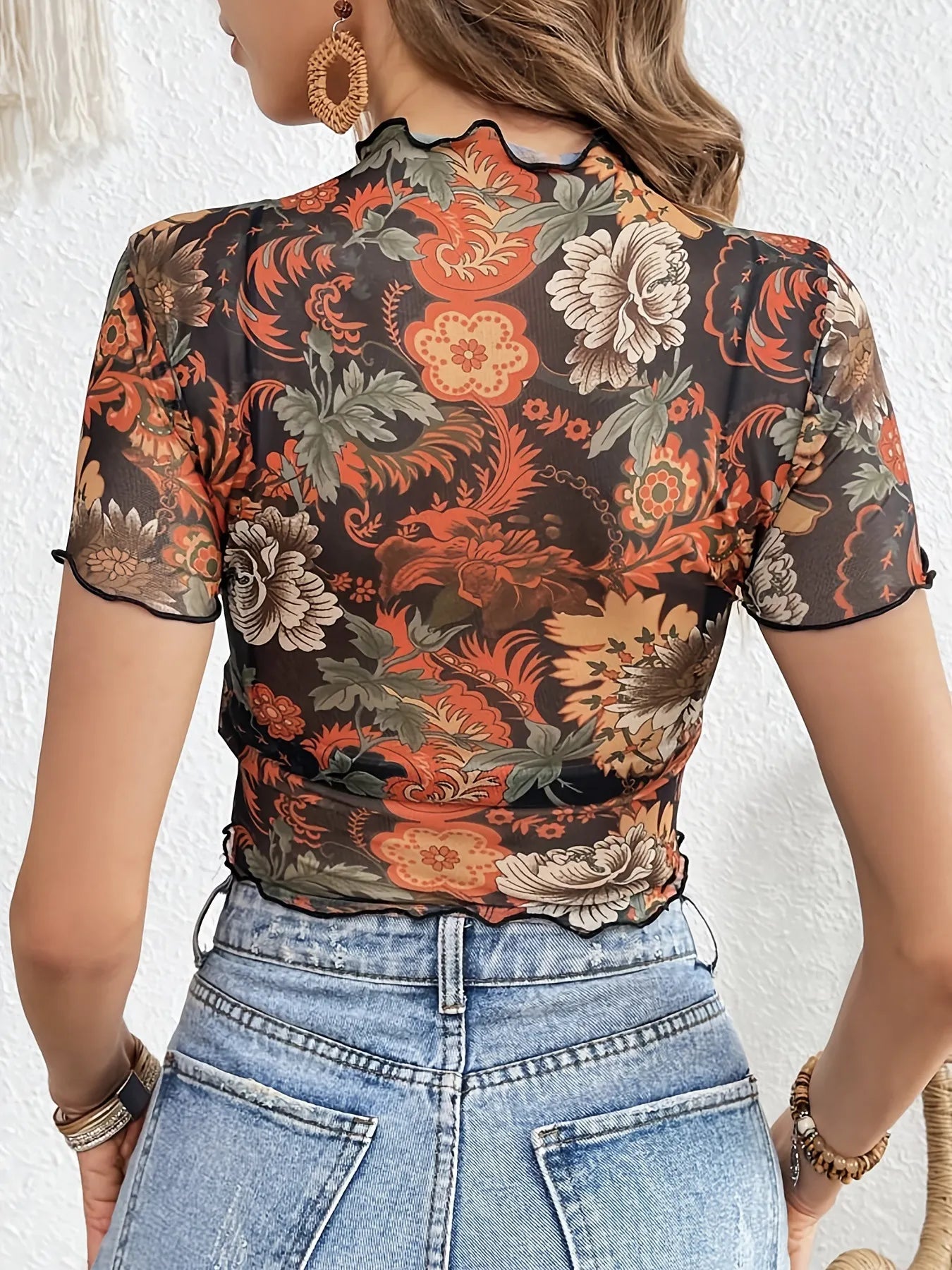 The Flore Top — Floral Mesh Crop Top with Lettuce Trim - Black, 3/4 angled view on model - Be Juliet