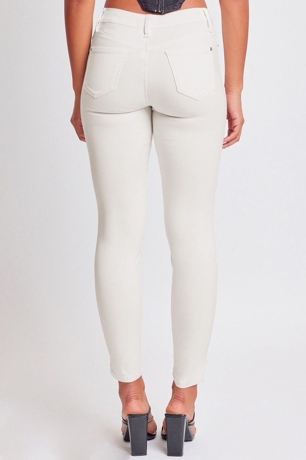 YMI Hyperstretch Mid-Rise Skinny Jeans - Vanilla Cream, back view on model - Be Juliet