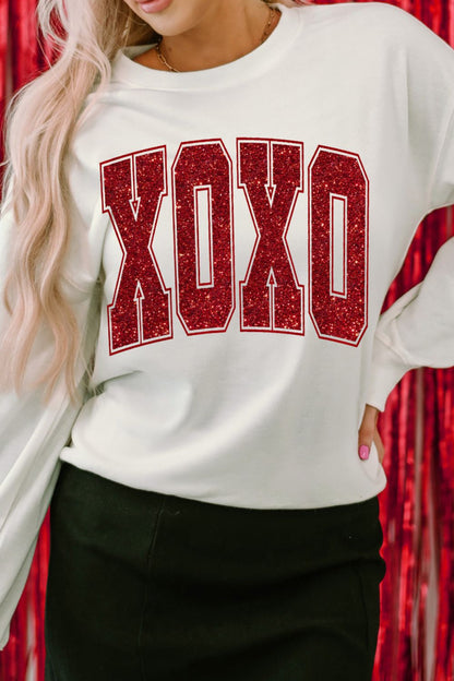Valentine’s Day XOXO Glitter Round Neck Sweatshirt - White, side view on model - Be Juliet