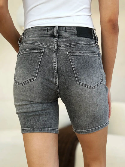 The Noelle Denim Cutoff Shorts - GREY, 3/4 angled view on model - Be Juliet