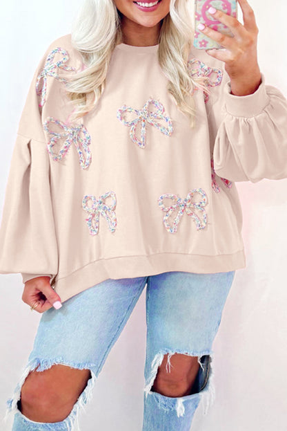 Bow Round Neck Long Sleeve Sweatshirt - Cream, front view on model - Be Juliet
