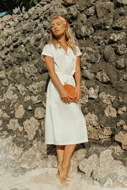 ARYA Safari Linen Midi Dress – Off White - 3/4 angled view on model - Be Juliet