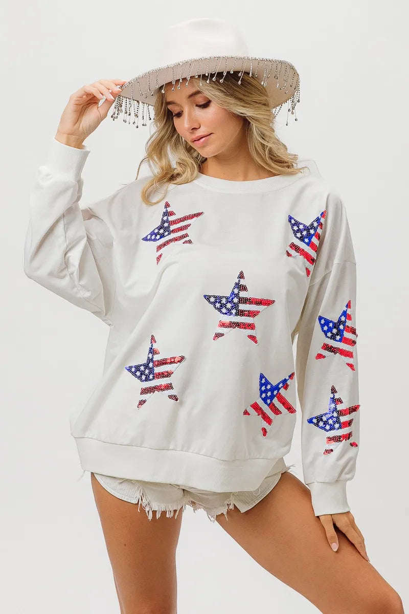 Sequin Star Flag Sweatshirt – Oversized Fit - OFF WHITE, 3/4 angled view on model - Be Juliet