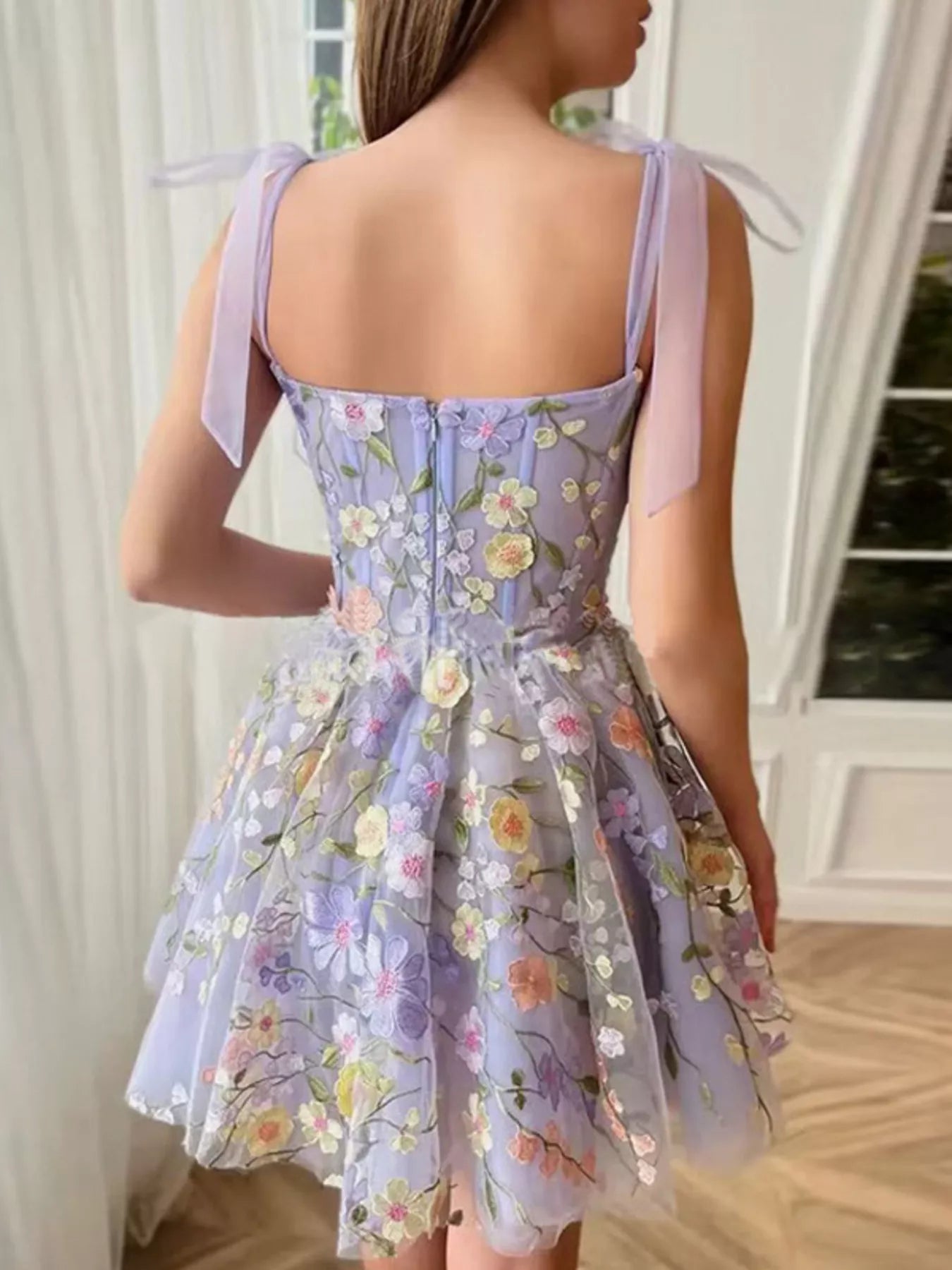 Floral Applique Tie Shoulder Mini Dress - Light Purple, back view on model, zipper closure and tie bow straps - Be Juliet