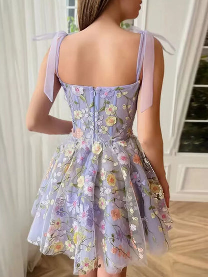 Floral Applique Tie Shoulder Mini Dress - Light Purple, back view on model, zipper closure and tie bow straps - Be Juliet