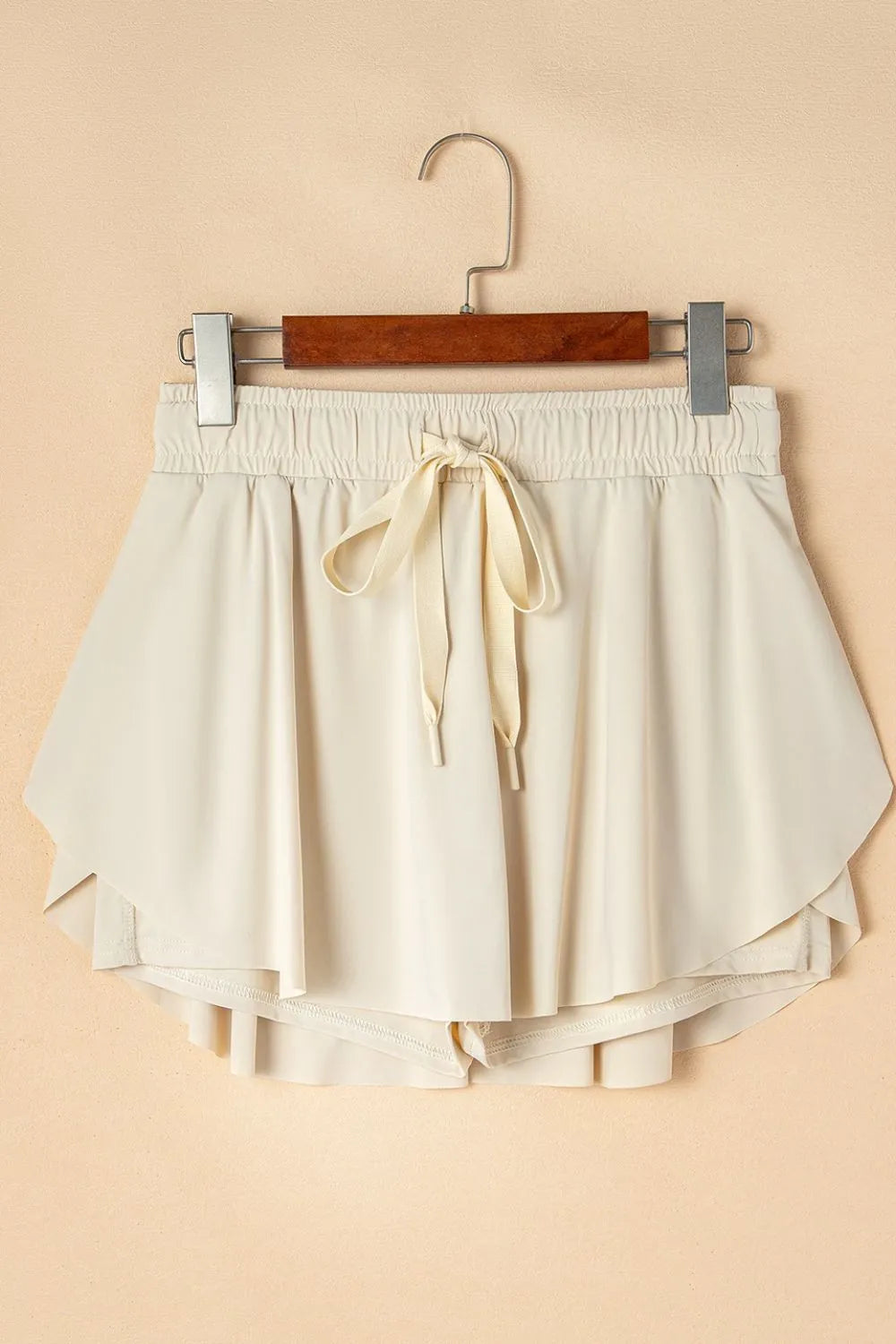 Romy Drawstring Active Skort - Beige, 3/4 angled view on model - Be Juliet