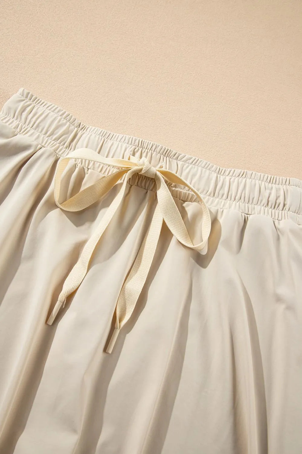 Romy Drawstring Active Skort - Beige, close-up detail - Be Juliet