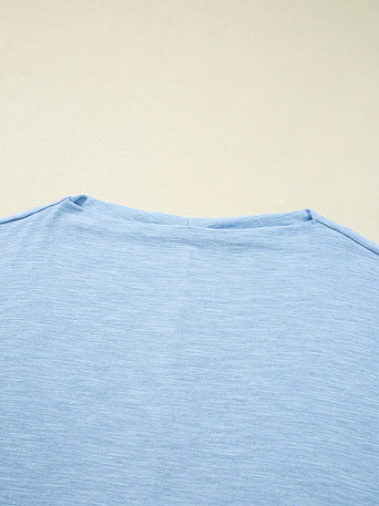 Maya Relaxed Batwing Top - Light Blue, 3/4 angled view on model - Be Juliet