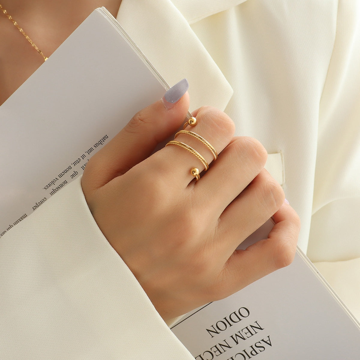 Titanium Steel Wrap Ring - Gold, side profile showing wrap design - Be Juliet