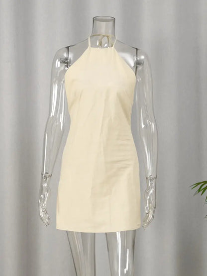 Backless Mini Halter Dress - Khaki, back open-back silhouette on model - Be Juliet