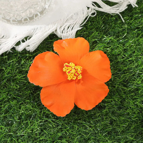 Away Hawaiian Flower Hair Clip - G, front view on model - Be Juliet