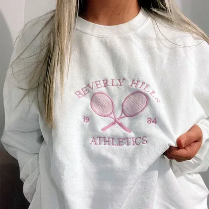 Serena Dreams Tennis-Inspired Sweatshirt - White, close-up front graphic on model - Be Juliet