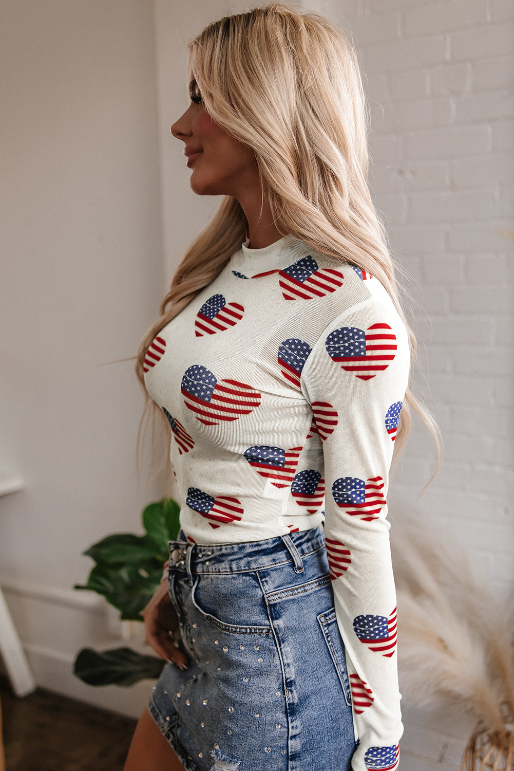 Americana Heart Mesh Long Sleeve Bodysuit - White, side profile view on model - Be Juliet