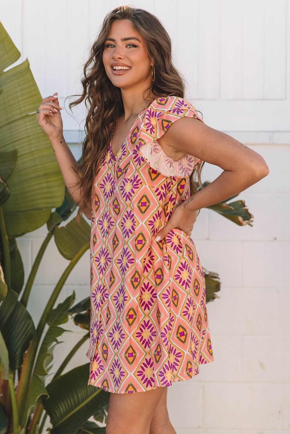 Geometric Floral V-Neck Button-Front Mini Dress - Orange, front 3/4 close-up, flutter sleeves - Be Juliet