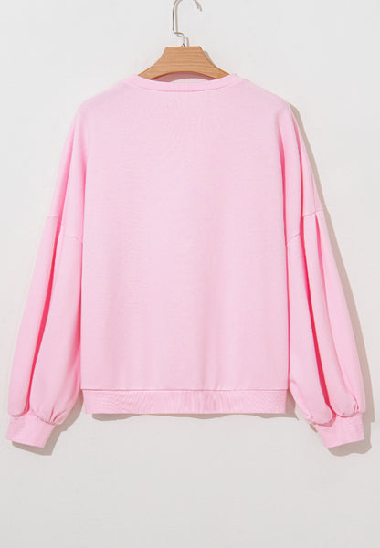 Bow Round Neck Long Sleeve Sweatshirt - Blush Pink, 3/4 angled view on model - Be Juliet