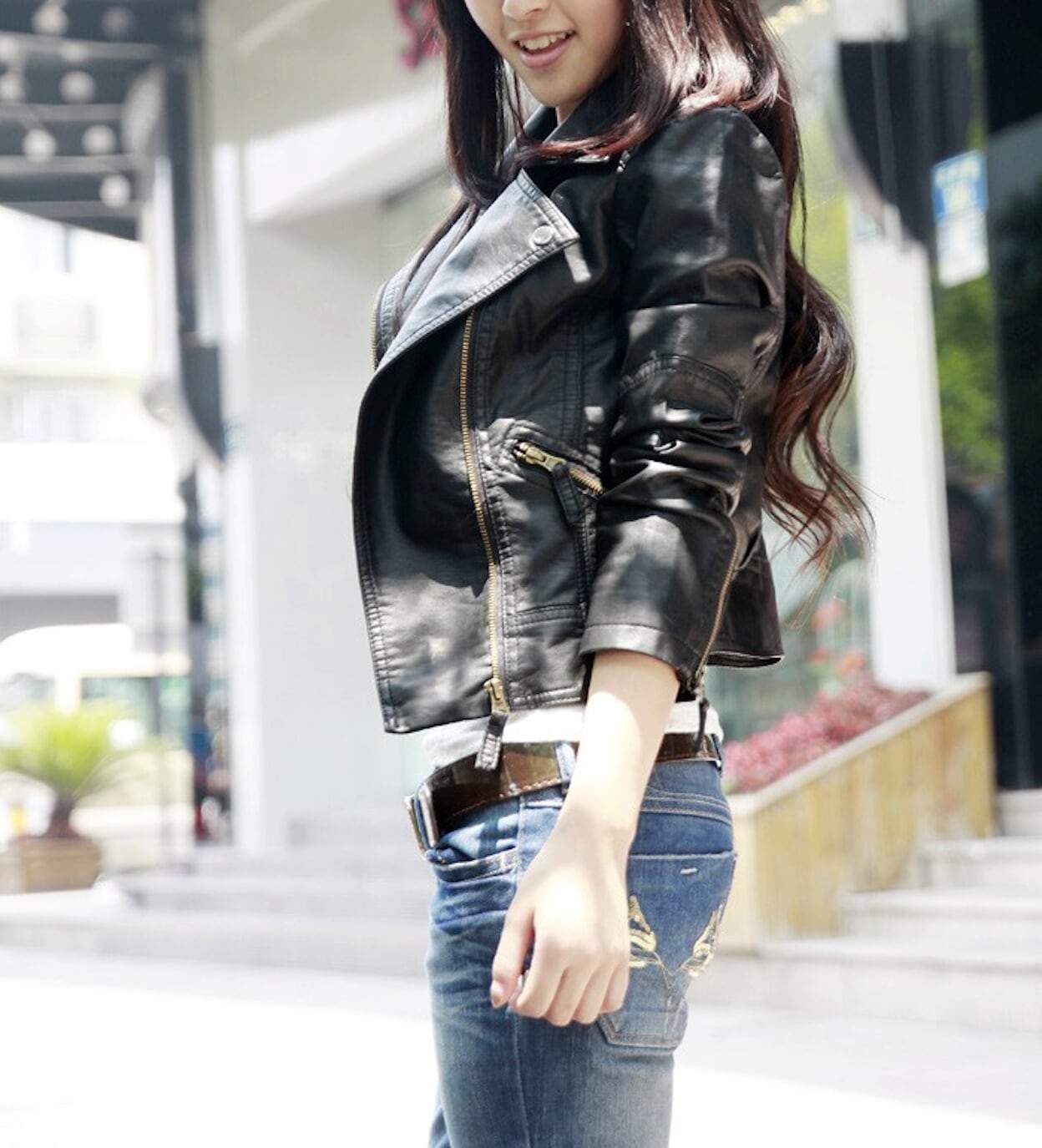 Womens Cropped Vegan Leather Jacket - Black, side view on model - Be Juliet